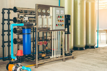 Water filter control system with water pump