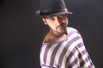 young indian man wear cap