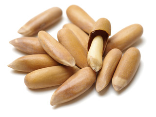 Pine nuts on white background
