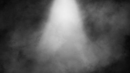 Dry ice smoke clouds fog the floor texture. . Perfect spotlight mist effect on isolated black background