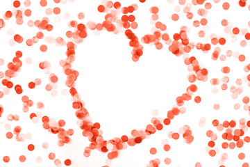 Bright coral confetti isolated on white background.