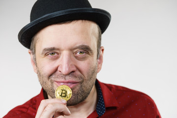 Man having bitcoin coin