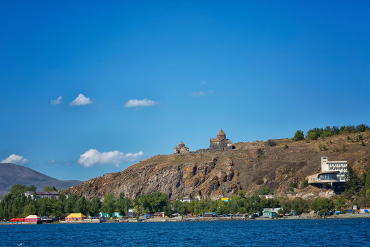 Scenic view of an old Sevanavank church in Sevan, Armenia on autumn day, blue sky