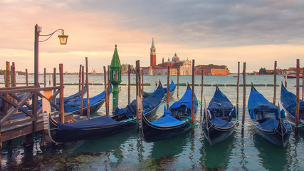 Fototapeta na wymiar Venice landscape at sunset. Venice gondolas on San Marco square, Grand Canal, Venice, Italy
