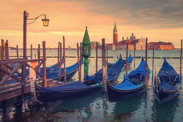 Plakat Venice landscape with gondolas at sunset, Italy. Beautiful view on San Giorgio di Maggiore church in Venice