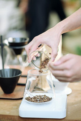 Weighing coffee grains
