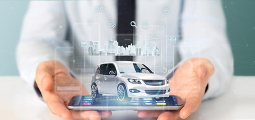 Businessman holding Dashboard smartcar interface with multimedia icon and city map on a background 3d rendering