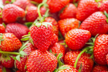 Fresh organic red ripe Strawberry fruit background closeup