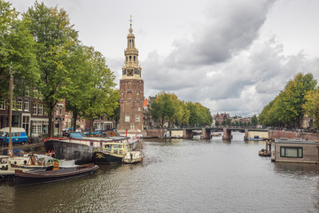 Fototapeta premium Looking at the Montelbaanstoren with the bridge just next to it