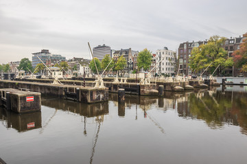 Obraz premium Locks on the Amstel river in the middle of Amsterdam