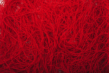 red threads on white background