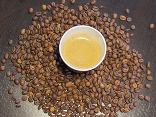 Cup of coffee beans, Scattered coffee beans around the cup