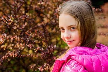 Fototapeta premium Spring bloom fragrance. Girl teen walk in botanical garden. Peaceful environment garden. Enjoying nature. Kid cute fancy child spend time in park. Explore garden. Excursion to botanical garden