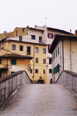 Fototapeta na wymiar Old bridge on the torrent Comano, Dicomano, Tuscany, Italy