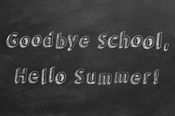 Hand drawing text "Goodbye School, Hello Summer !" on blackboard