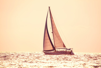 modern yacht sailing on the skyline