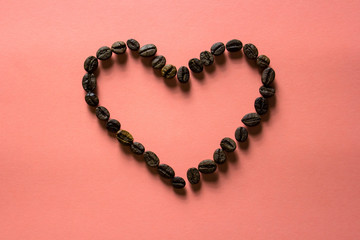 coffee hearth on pink background with copy space