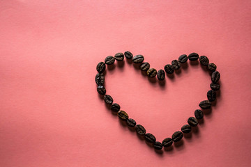 coffee hearth on pink background with copy space