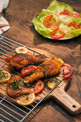 Grilled chicken breast spiced with chili peppers and rosemary