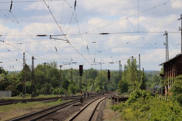 Rail track with tank car and adjacent station building