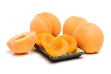 peaches in syrup on a white background 