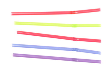 Colorful drinking straws isolated on white background, top view