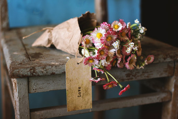 bouquet of flowers with tag
