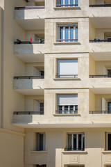 Beige façade of a building in Marseille, south of France, Provence, France.