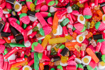 Assorted mix of colorful candies and gummy bears