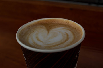  Delicious coffee and heart drawing on coffee.