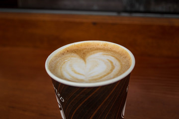  Delicious coffee and heart drawing on coffee.