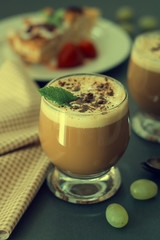Coffee cold drink with vanilla ice cream and espresso. Deliciouse summer refreshing drink in glass.