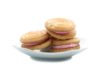 sandwich cookies with strawberry cream on white background