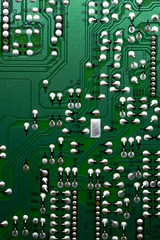 Composant électonique et circuit informatique de carte mère