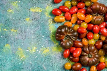 Market fresh raw colorful tomatoes