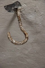 old rustic hook on ceiling 