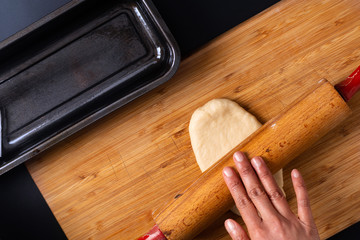 Food Baking concept Making organic homemade soft milk loaf bread in loaf pan on wooden board with copy space