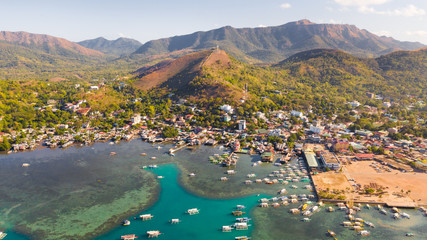 Sign of the city of Coron on the hill. Palawan Busuanga.Cross on hill, sign of the city of Coron...