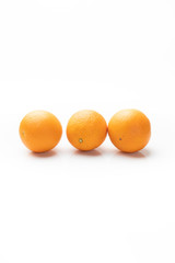 Oranges, orange fruit on a white background.