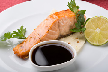 Prepared salmon steak served on a plate