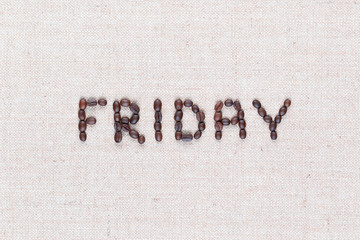 The word Friday written with coffee beans , aligned in the center, closeup.