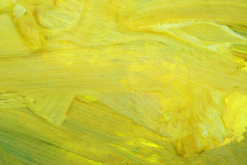 yellow paint on canvas close-up brush strokes