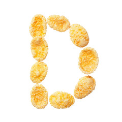 Yellow cornflakes letter D isolated on white background. Alphabet cereal flakes.