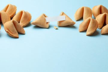 Chinese fortune cookies. Cookies with empty blank inside for prediction words. Blue background Copy space for text.