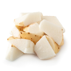 Yamaimo roots and slices or Chinese yam isolated over white background