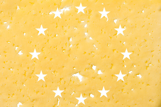 EU Flag Cut Out Of Cheese, As A Symbol Of The Import Or Export Of Cheese On A White Isolated Background