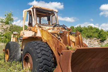 Yellow cracked excavator