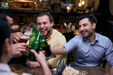 Friends making a toast in the pub