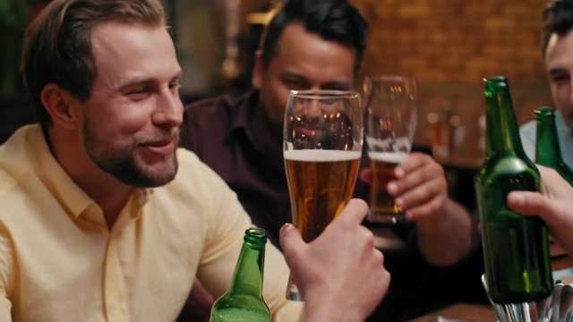 Men making a cheers for good weekend
