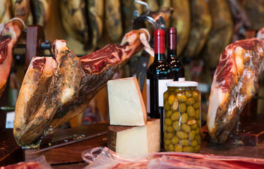jerked iberic jammon of bacon with wine, cheese and olives